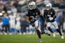 Raiders safety Thomas Harper (34) defends against the Los Angeles Chargers during the first hal ...