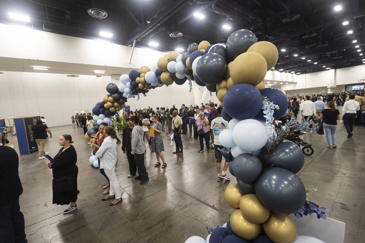 Attendees line up for interviews with Fontainebleau during the spring job fair at the Las Vegas ...