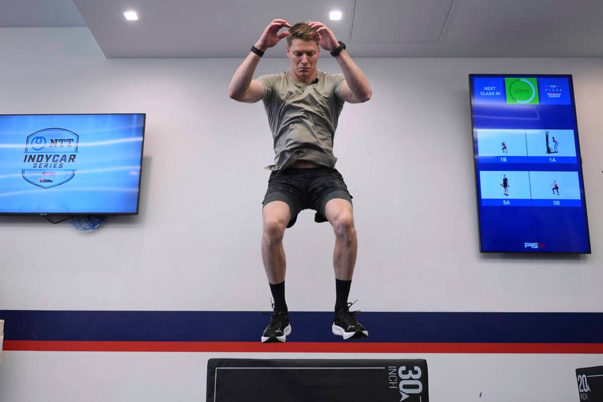 Two-time IndyCar series champion Josef Newgarden leads a group through the paces of his physica ...