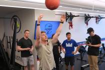Two-time IndyCar series champion Josef Newgarden, center, leads a group through the paces of hi ...