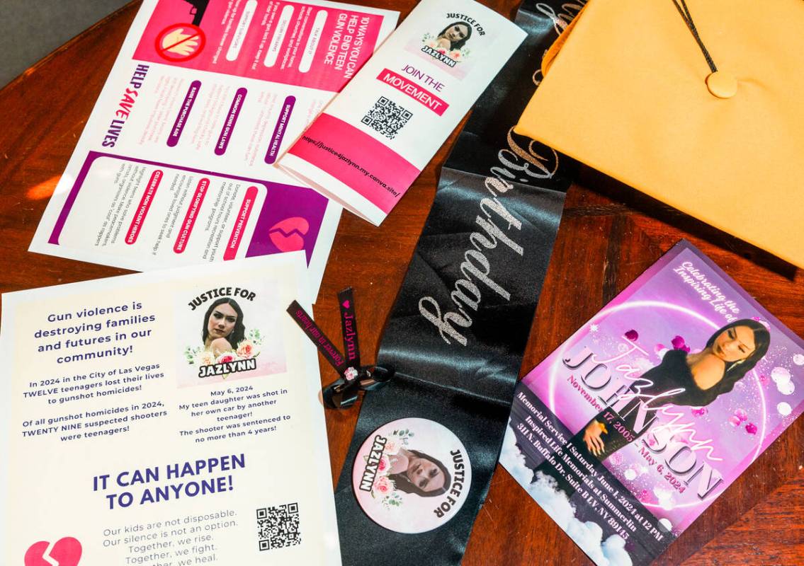 Memorabilia commemorating Jazlynn lies strewn across a table. Susan Johnson, Jazzlyn's mother, ...