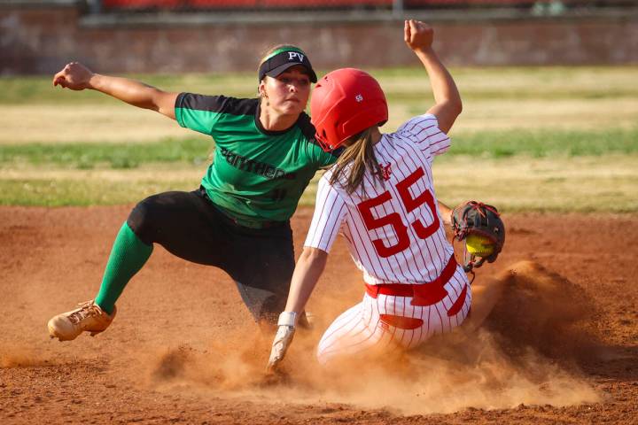 Palo Verde's Taylor Johns (11) tags out Arbor View's Lilly Easton (55) at second base during a ...