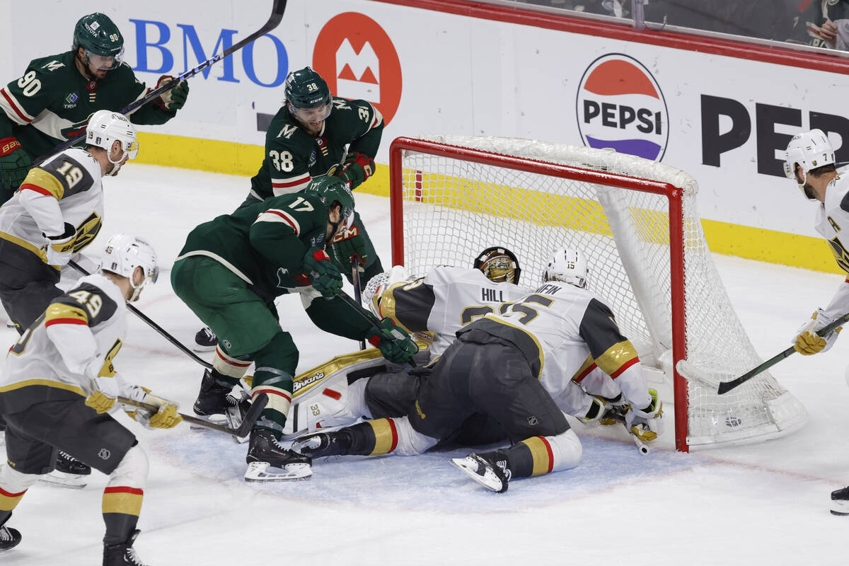 Minnesota Wild right wing Ryan Hartman (38) scores against Vegas Golden Knights goaltender Adin ...
