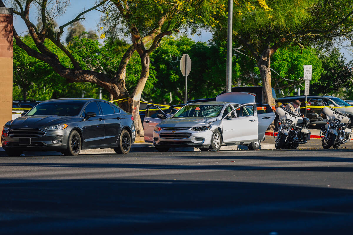 Metro police investigate a car after a female high school student was struck in front of Arbor ...