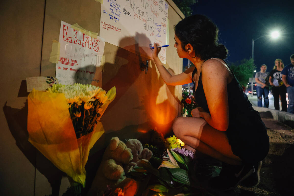 Arbor View students gather outside of their school for a vigil in honor of McKenzie Scott, a hi ...