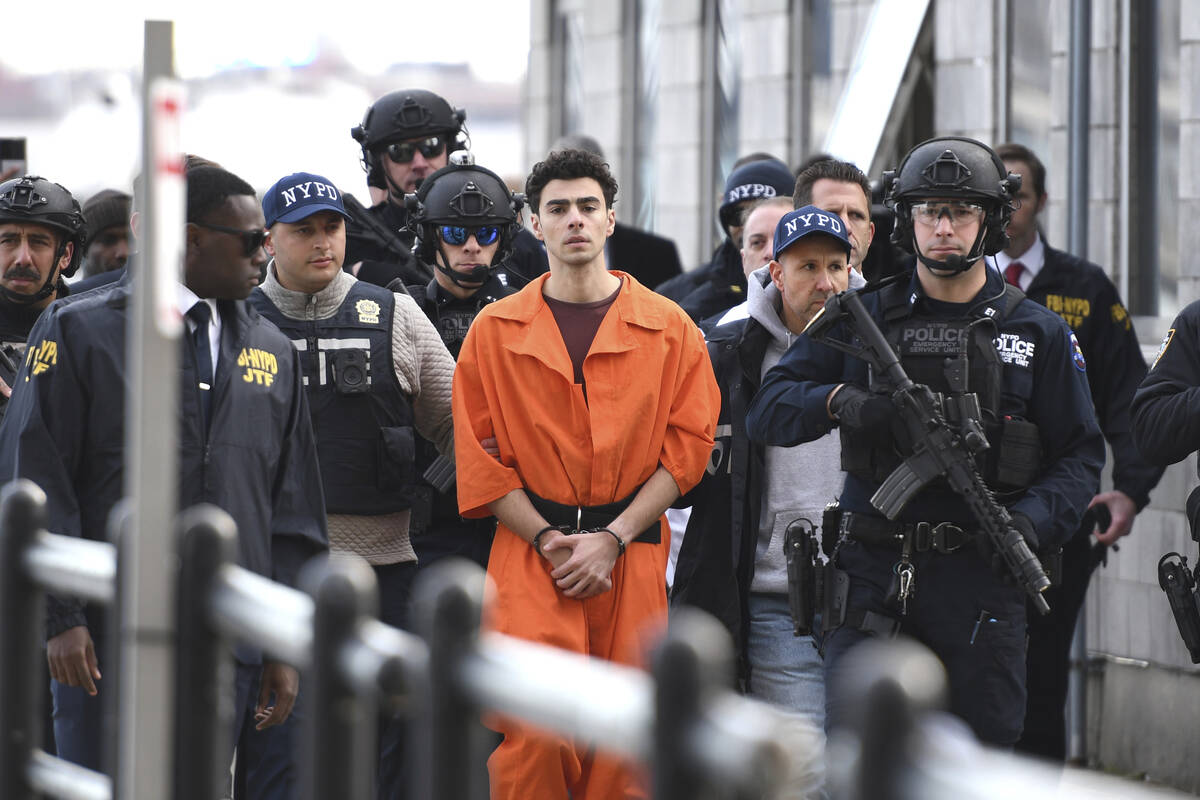 Luigi Mangione, a suspect in the fatal shooting of UnitedHealthcare CEO Brian Thompson, is esco ...