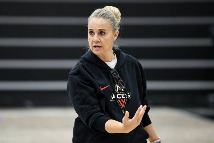 Las Vegas Aces head coach Becky Hammon talks to her players during the Aces first day of traini ...