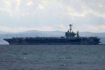FILE - Aircraft carrier USS Harry S. Truman is moored near Split, Croatia, Feb. 14, 2022. (AP P ...