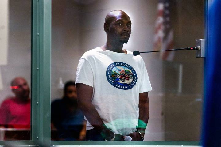 Keenan Jackson stands for his initial hearing at the Regional Justice Center on Saturday, May 3 ...