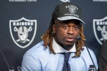 Raiders running back Ashton Jeanty answers questions during a news conference at the Intermount ...