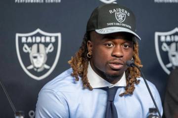 Raiders running back Ashton Jeanty answers questions during a news conference at the Intermount ...