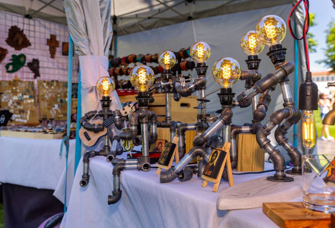 Industrial lamps created by artist Remon Adel are a few of the many items for sale during the S ...