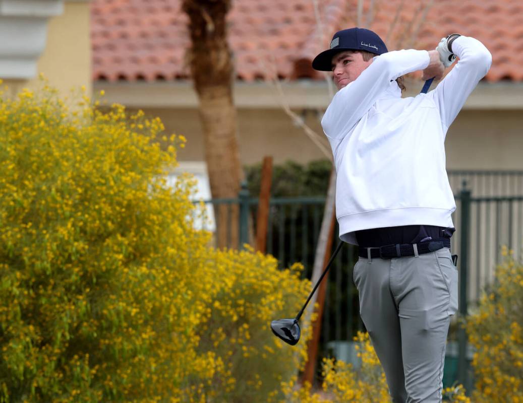 Colby Hutton of Bishop Gorman watches his tee shot on the third hole during the NIAA 5A Mountai ...