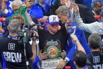 Canelo Alvarez, center, celebrates after wining against William Scull during super middleweight ...