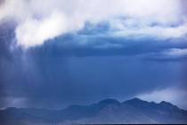 Storm clouds above mountains at the edge of Summerlin Sunday, May 16, 2021. (Rachel Aston/Las V ...