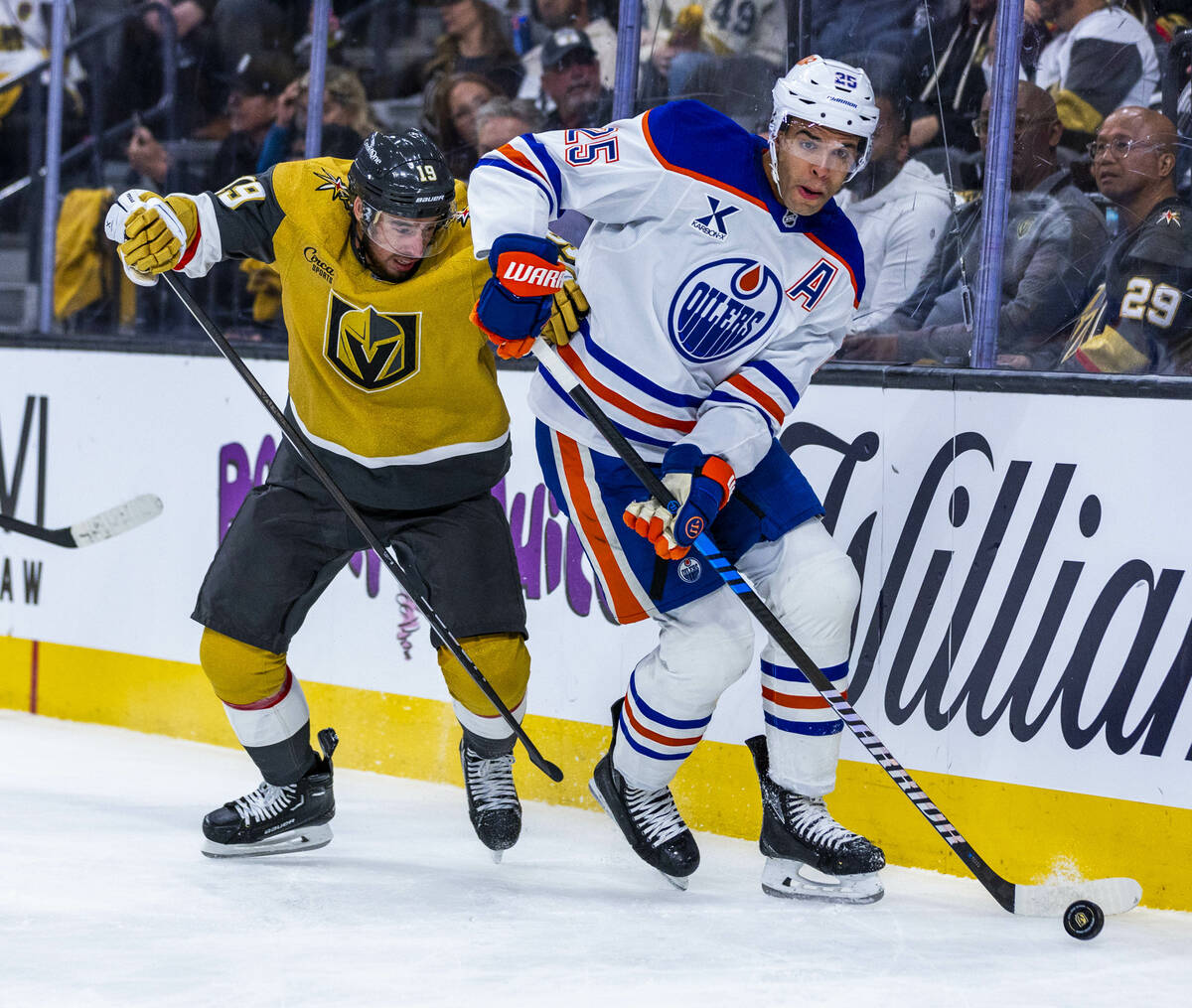 Edmonton Oilers defenseman Darnell Nurse (25) controls the puck as Golden Knights right wing Re ...