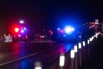 Nevada Highway Patrol officers investigate the scene of a fatal crash on northbound Interstate ...