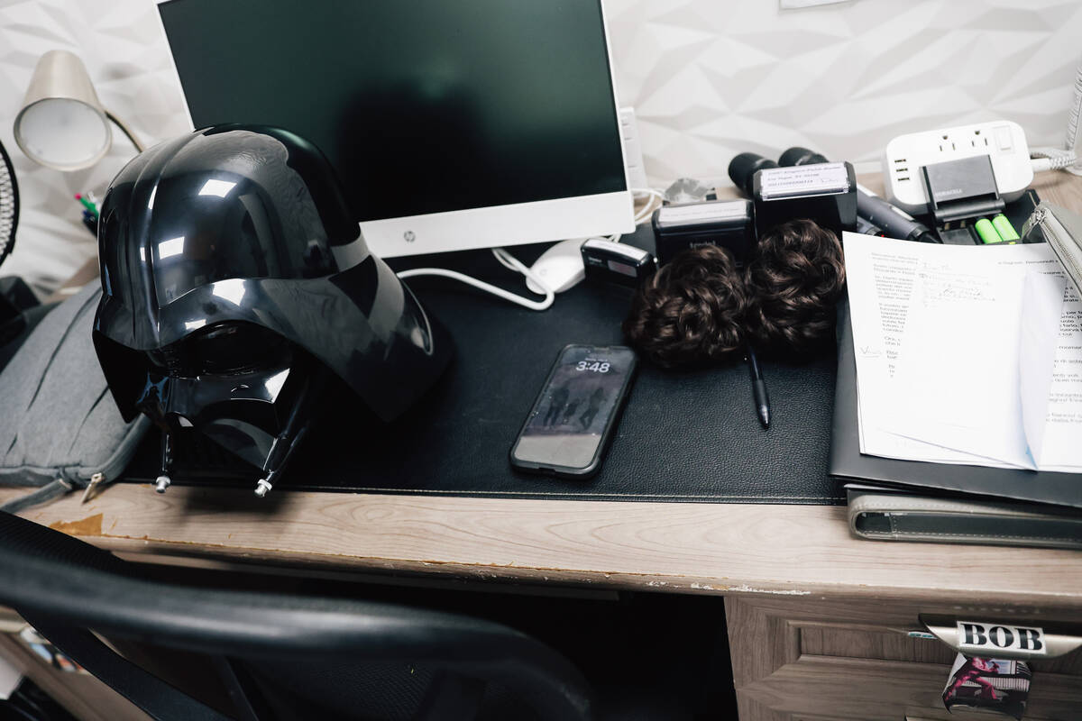 A Darth Vader mask sits on a desk for “Star Wars” themed weddings at The Little ...