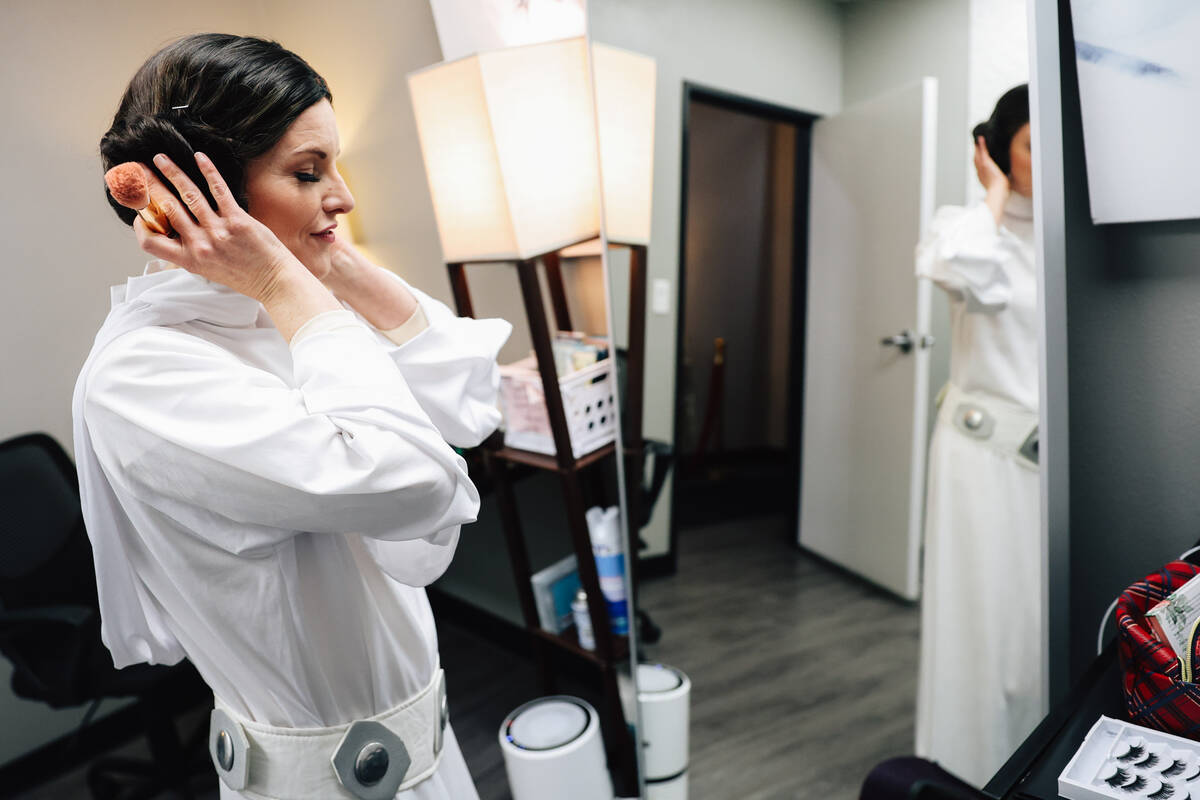 Wedding officiant Sabrina Plaisance-Sia gets ready to officiate a wedding dressed as Princess L ...