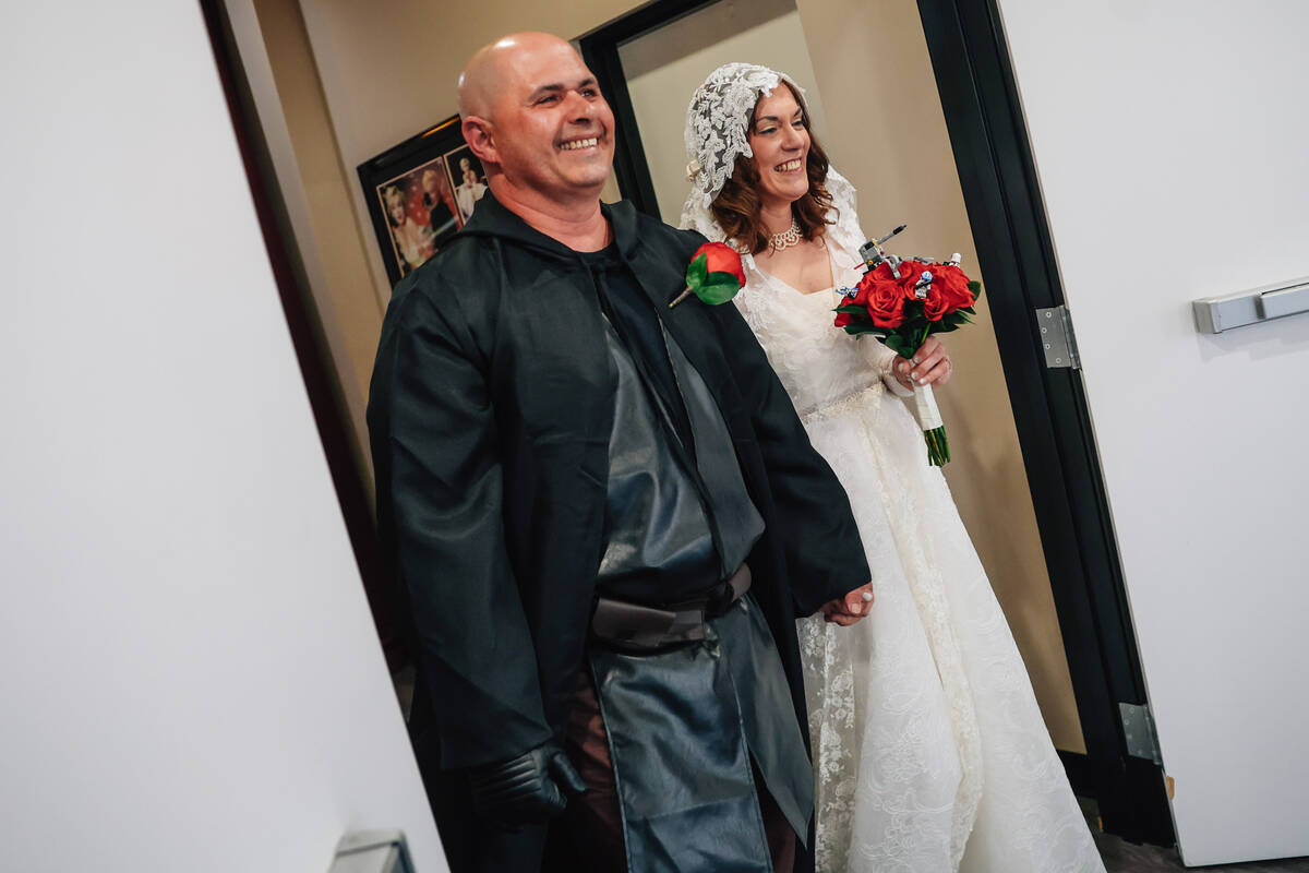 William McCormack, left, and his bride, Celeste McCormack, are introduced as a married couple d ...