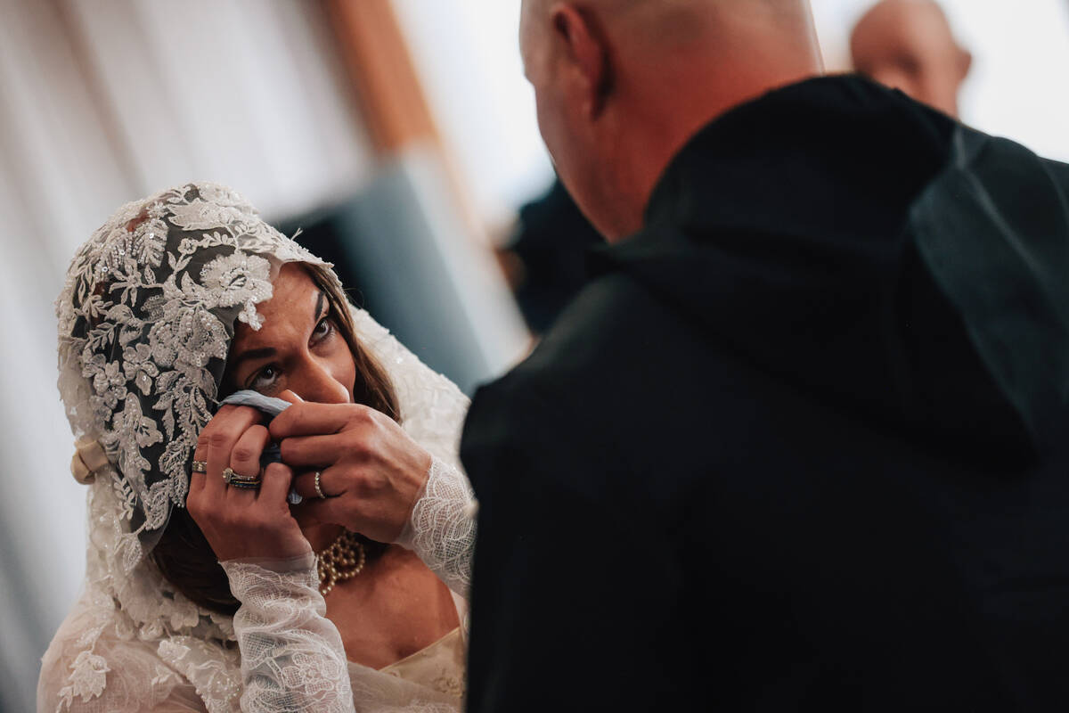 Celeste McCormack cries as she looks to her groom, William, during a “Star Wars” ...