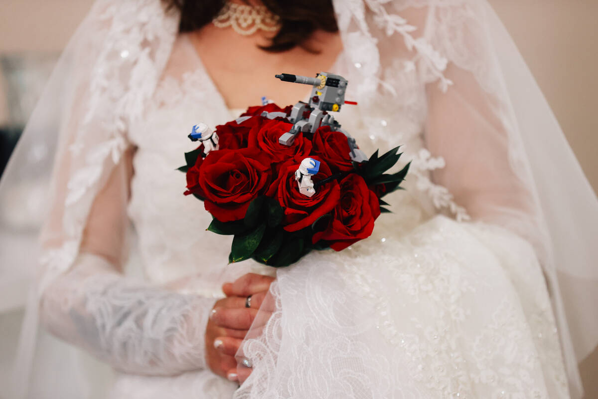 Celeste McCormack holds her themed wedding bouquet during a “Star Wars” themed we ...