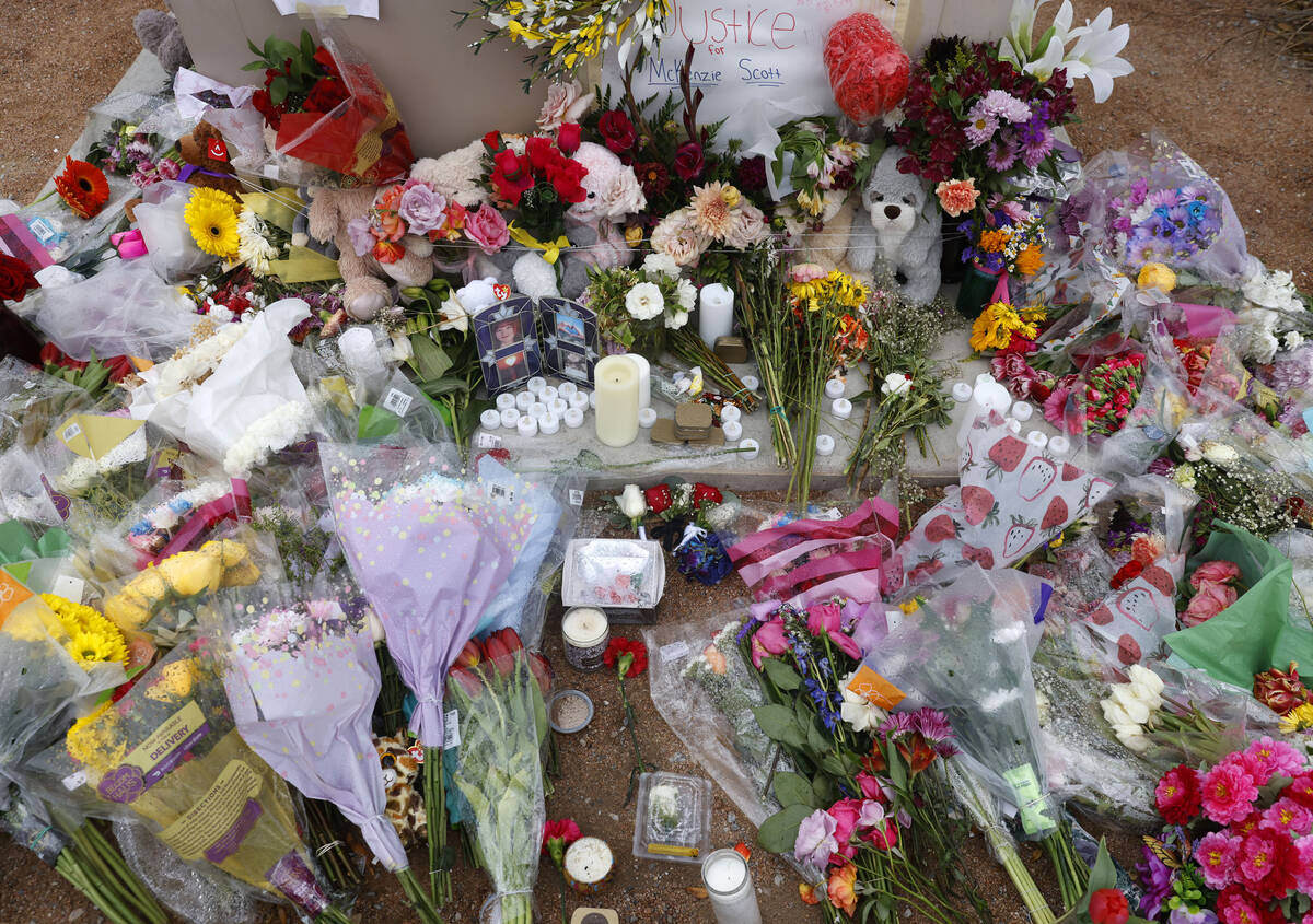A makeshift memorial for McKenzie Scott, a senior at Arbor View High School, who was killed in ...