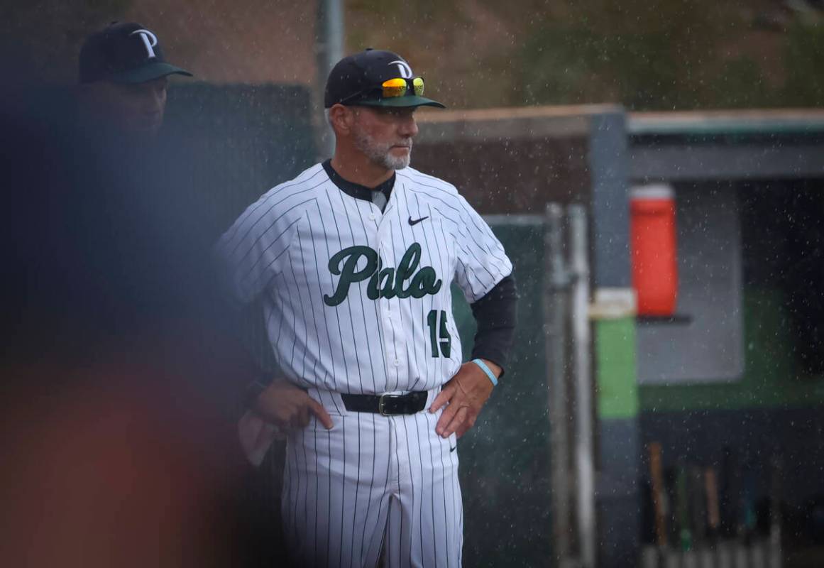 Palo Verde acting baseball coach Charlie Cerrone looks on as officials move to suspend a playof ...