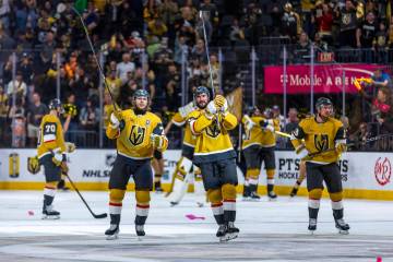 Golden Knights center William Karlsson (71), center Nicolas Roy (10) and right wing Reilly Smit ...
