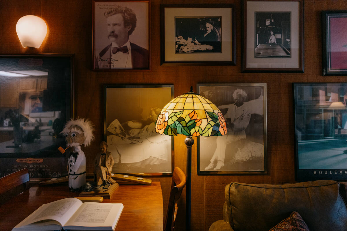Images of Mark Twain line the walls of McAvoy Layne’s home on Monday, April 21, 2025 in Incli ...