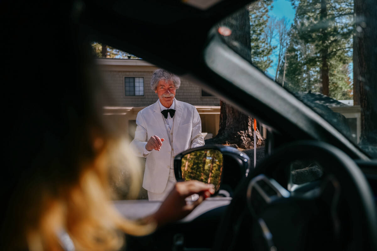 McAvoy Layne waves goodbye as Review-Journal reporter Jessica Hill drives away from his home on ...