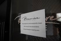 A sign noting a temporary closure at talian restaurant Bramàre is seen on Tuesday, May 6, ...