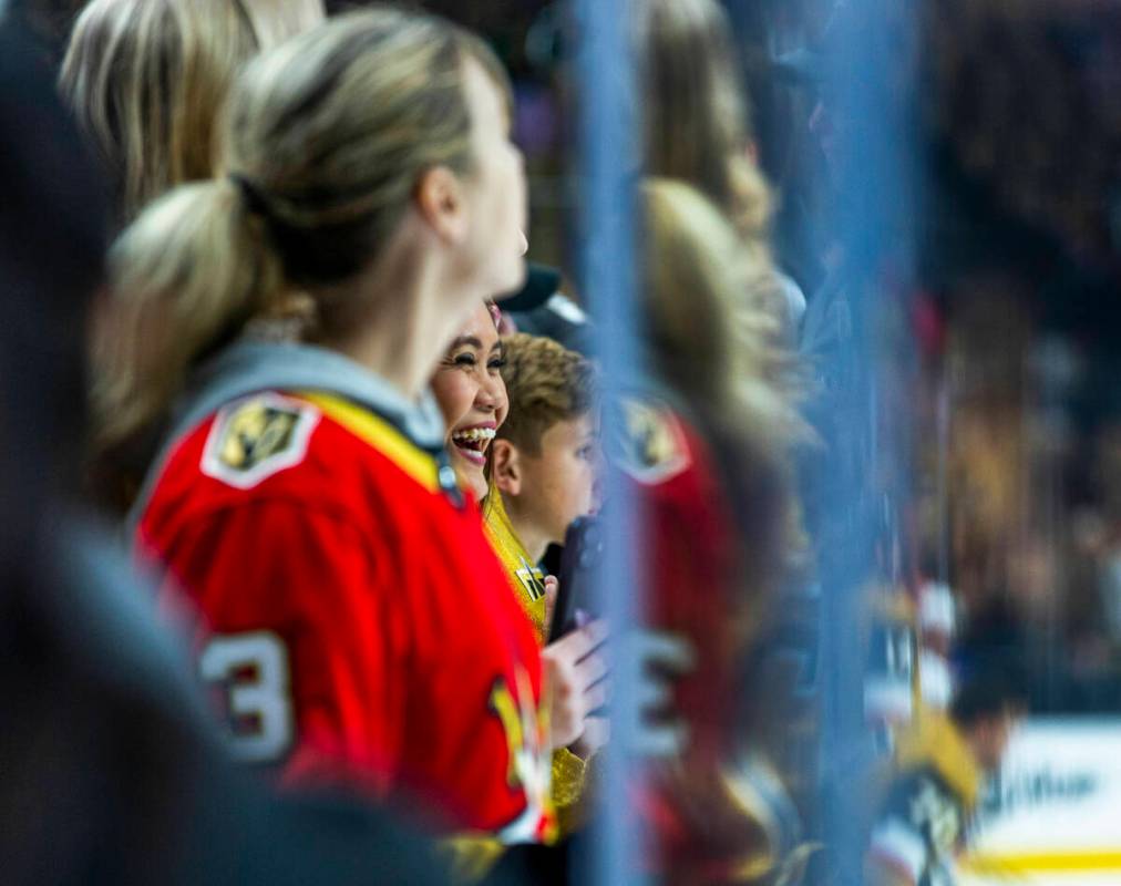 Fans have fun at the glass during the warm ups before first period of game one in the Golden Kn ...