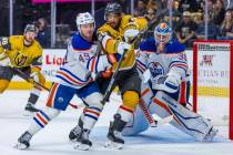 Golden Knights right wing Keegan Kolesar (55) deflects a shot past Edmonton Oilers defenseman T ...