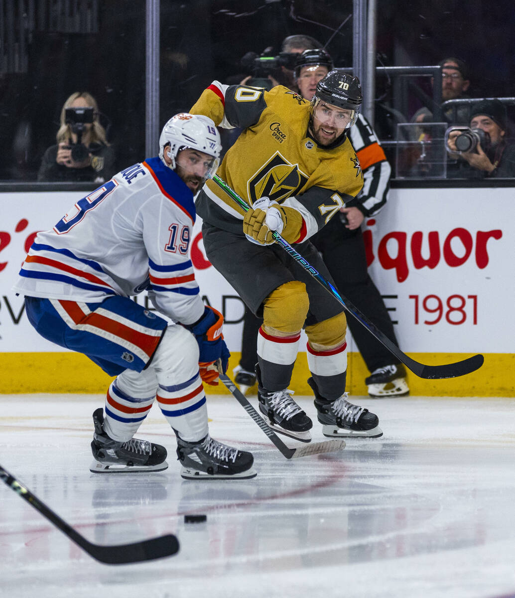 Golden Knights left wing Tanner Pearson (70) sends a pass across past Edmonton Oilers center Ad ...