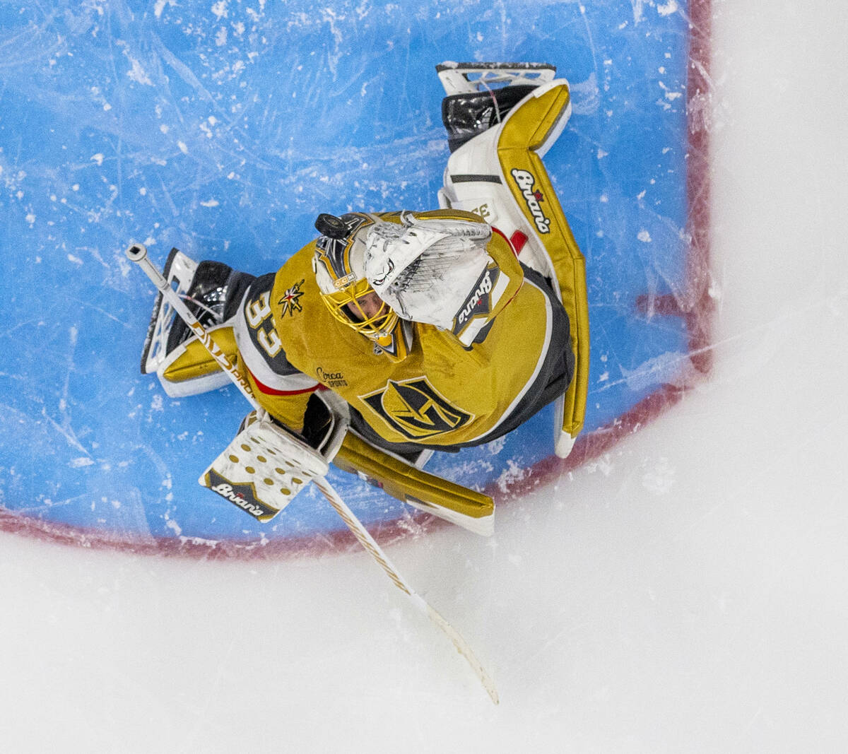 Golden Knights goaltender Adin Hill (33) deflects away a shot b y the Edmonton Oilers during th ...