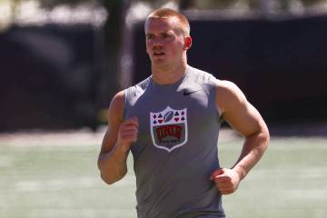 UNLV linebacker Jackson Woodard warms up for the 40-yard dash during UNLV football's Pro Day at ...