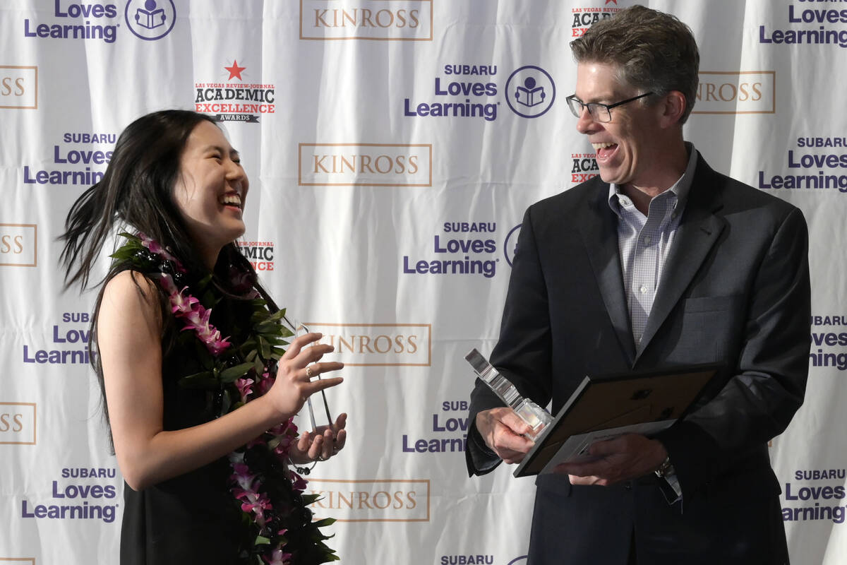 Michelle Park reacts while receiving the Findlay Subaru of Las Vegas Love Promise Community Awa ...