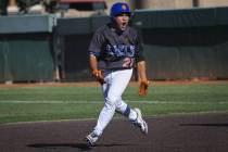 Bishop Gorman's Jonas Yatson reacts to his home run hit against Arbor View during a playoff bas ...