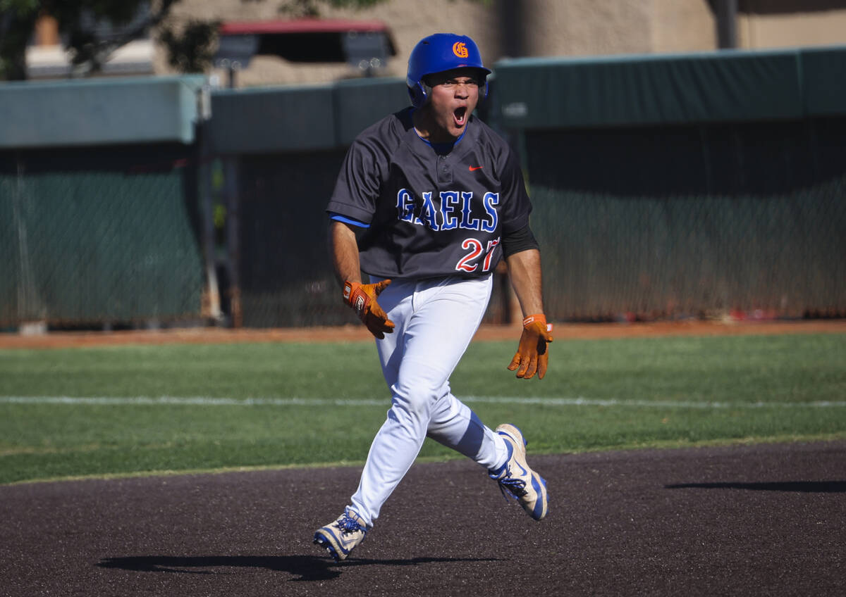 Bishop Gorman's Jonas Yatson reacts to his home run hit against Arbor View during a playoff bas ...