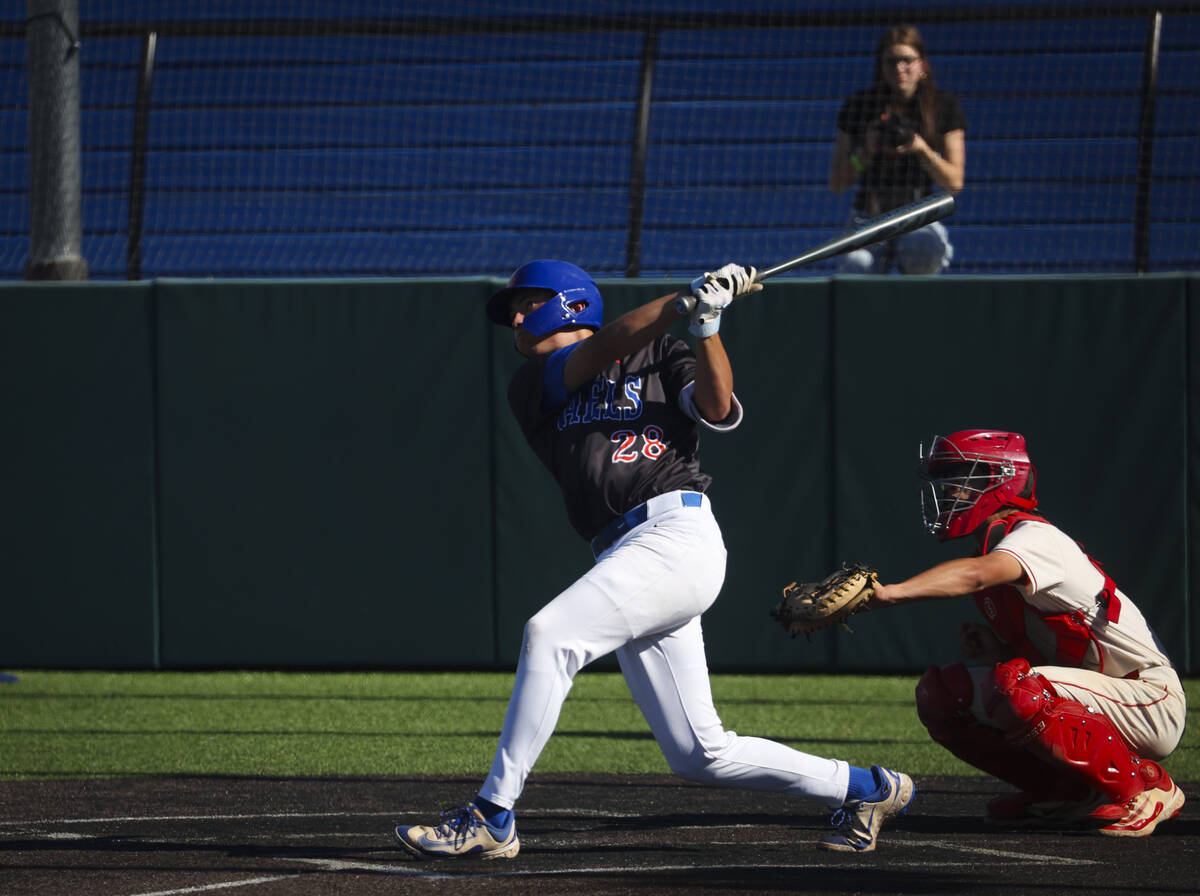 Bishop Gorman's Chase Wilk hits a home run against Arbor View during a playoff baseball game at ...