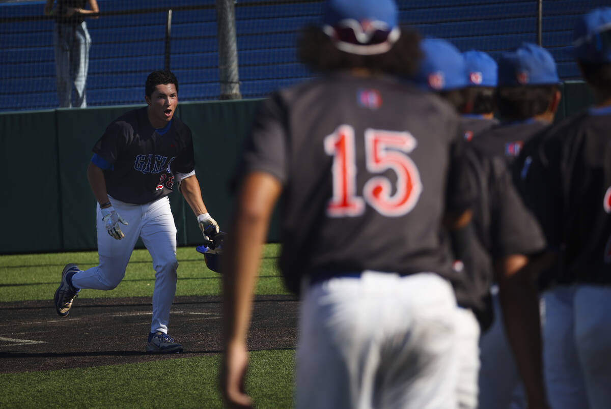 Bishop Gorman's Chase Wilk (28) celebrates his home run during a playoff baseball game against ...
