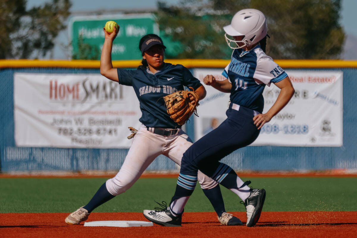 Shadow Ridge infielder Rosely Hensley-Mokiao (10) winds up to throw to first after putting out ...