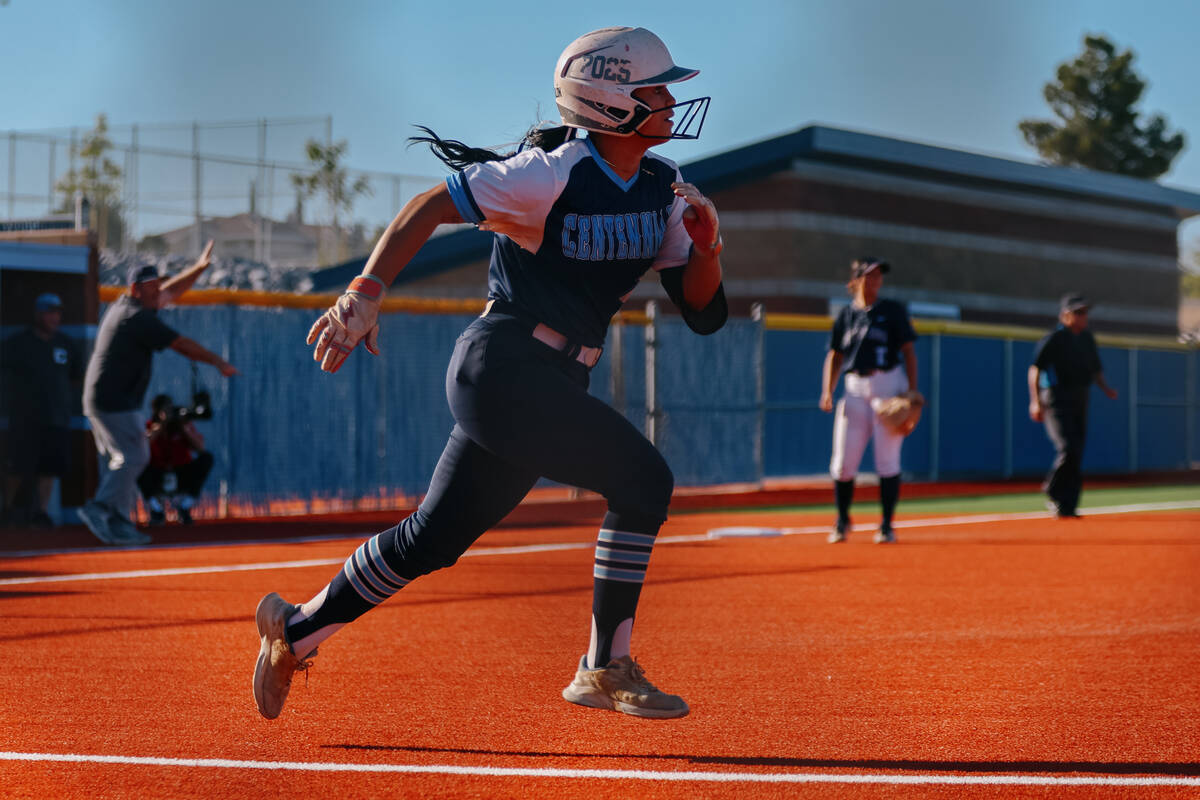 Centennial’s Amanda Campos-Colon (13) sprints to first after hitting a ball during the N ...