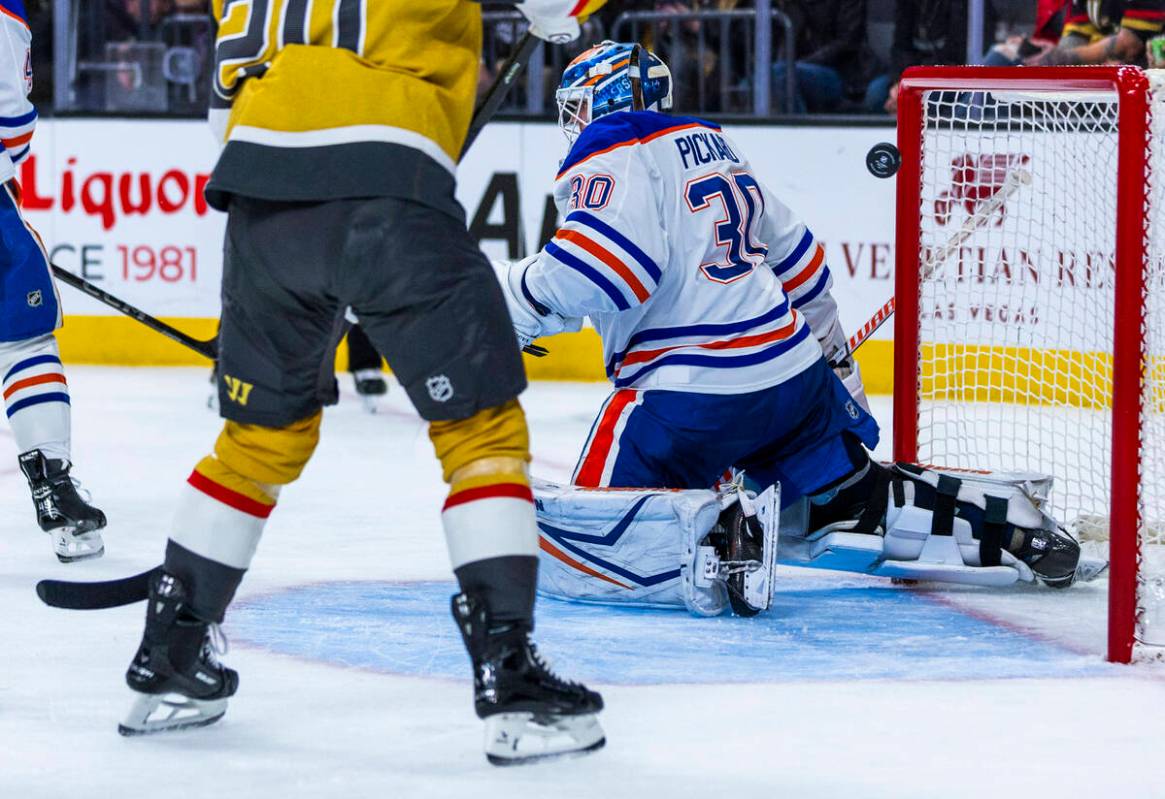 The Golden Knights shot puck hits the post getting past Edmonton Oilers goaltender Calvin Picka ...