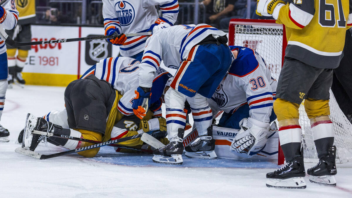 Golden Knights center Tomas Hertl (48) has a shot trapped under the pads of Edmonton Oilers goa ...