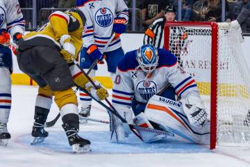 Golden Knights center Tomas Hertl (48) has a shot trapped under the pads of Edmonton Oilers goa ...