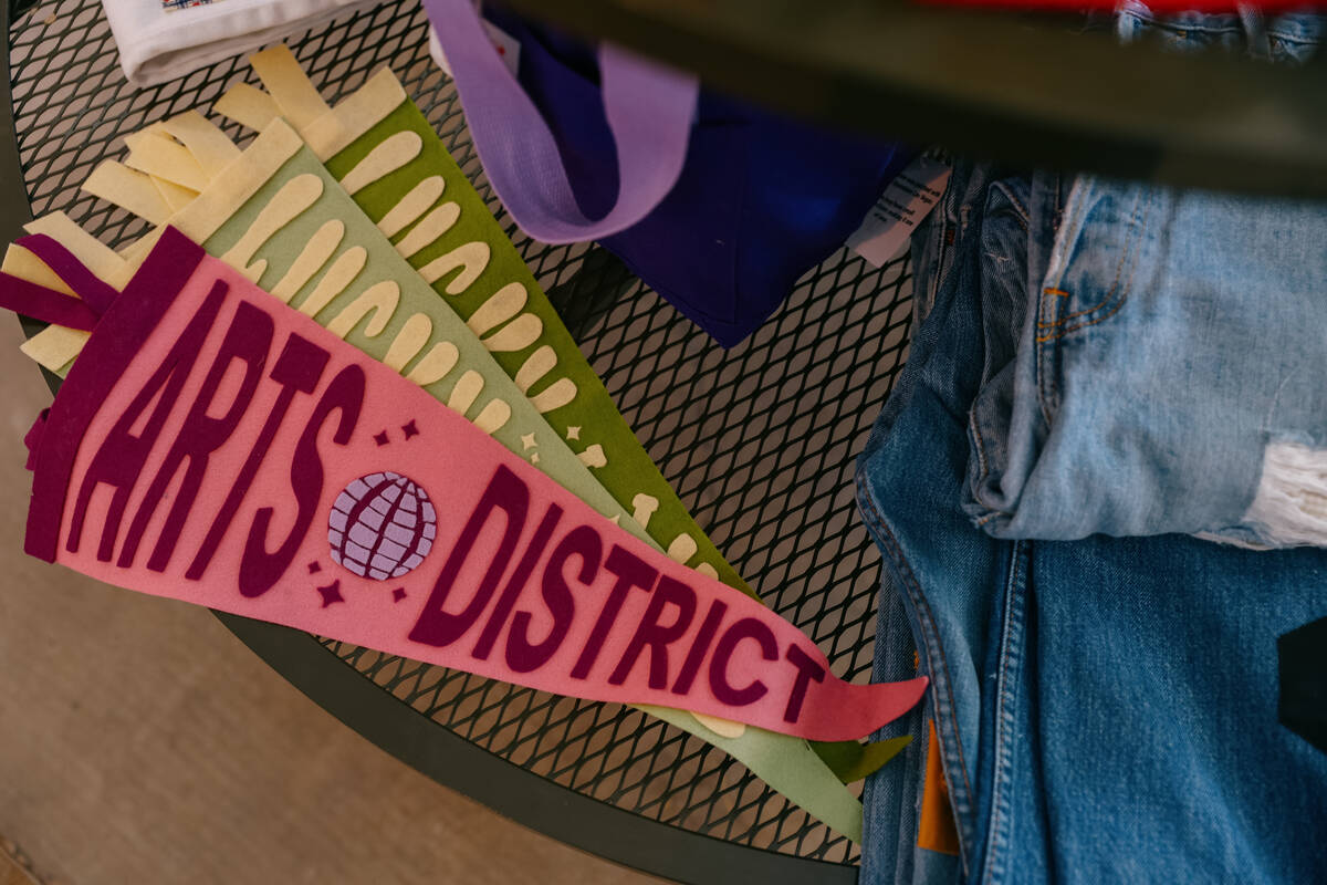 Felt Arts District pennants sit on a shelf at Akin Cooperative on Tuesday, May 6, 2025 in Las V ...