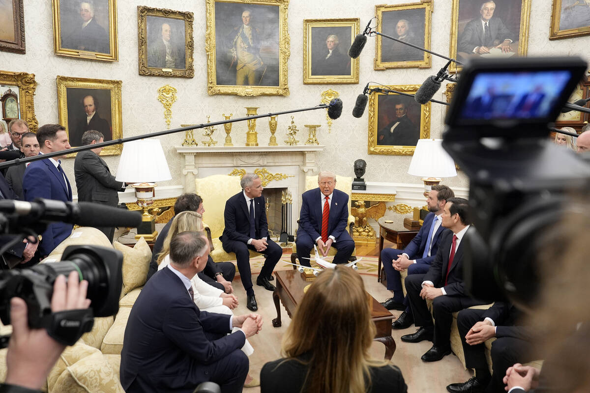 Canadian Prime Minister Mark Carney and U.S. President Donald Trump meet at the White House in ...
