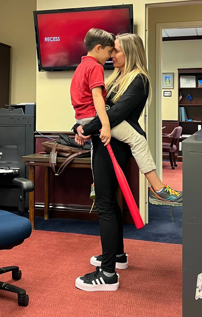 Assemblymember Danielle Gallant, R-Las Vegas, holds son Maddox while in her office in Carson Ci ...